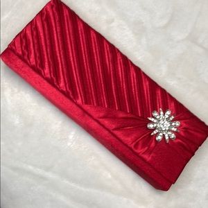 Clutch red with daimond flower on side satin fabri
